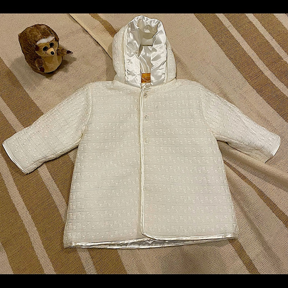 Vintage white quilted children’s jacket.